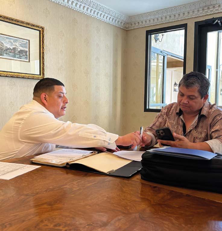 Los Angeles small business consultant Marcelo Umanzor Blanco providing professional guidance and sales tax filing assistance to a local entrepreneur.